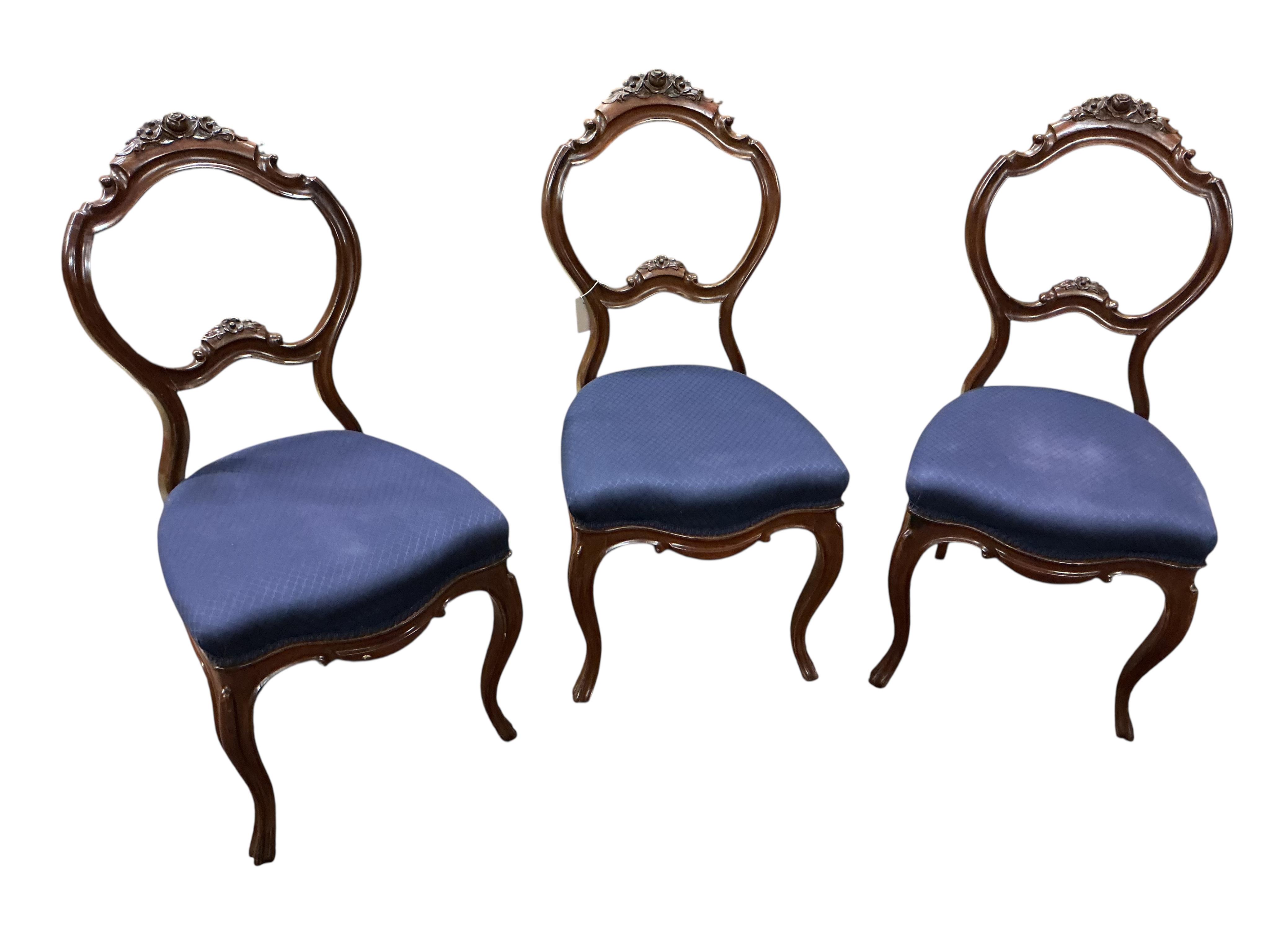 A set of six 19th century French carved mahogany balloon back dining chairs, width 46cm, height 96cm